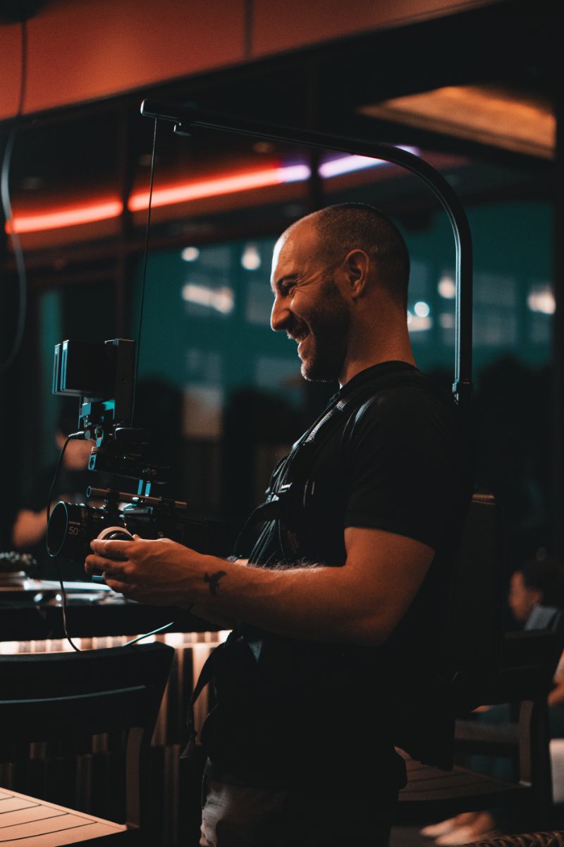 Todd Aftel filming and directing at a video shoot